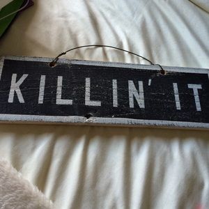 "Killin' it" sign