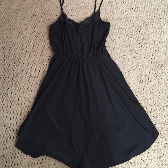 Lace trim black dress from Nasty Gal