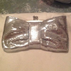Sequenced, over-sized bow clutch from Rue 21