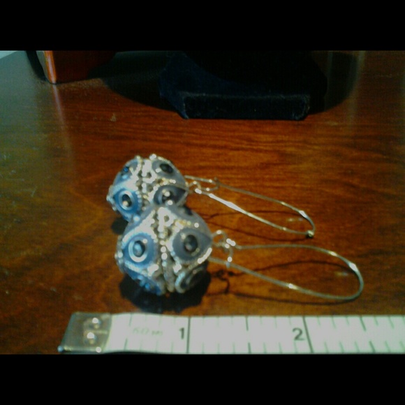 Silvertone drop globe earrings