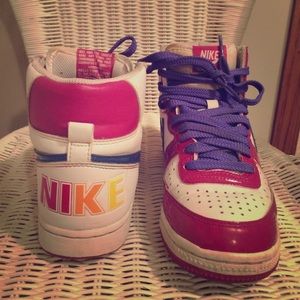 purple pink and white Nike hightops size 6