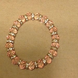 Pink bracelet with rhinestones