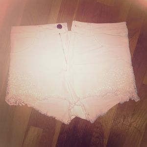 High wasted white shorts with lace on sides