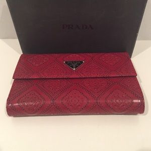 Prada red ornate leather tri fold wallet