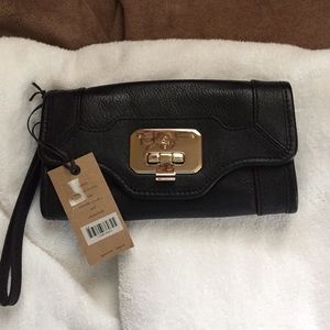 ON HOLD.  Cole Haan Black Clutch