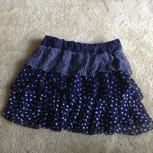 White polka dot and blue ruffle skirt