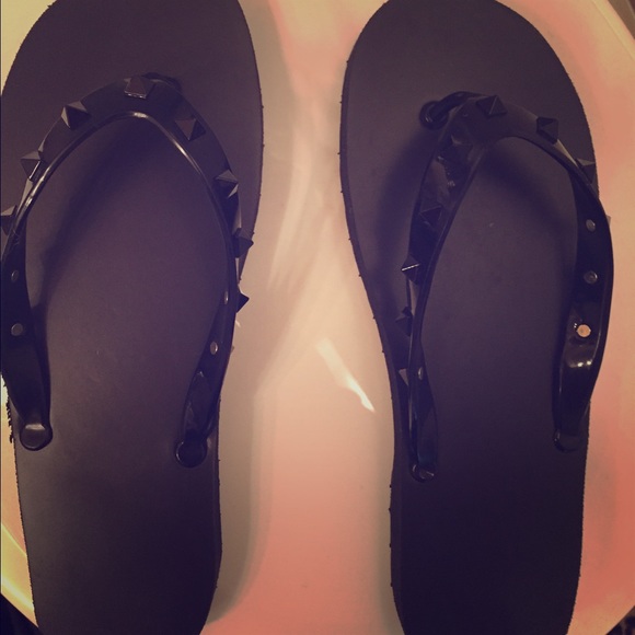 Black Valentino studded flip flops