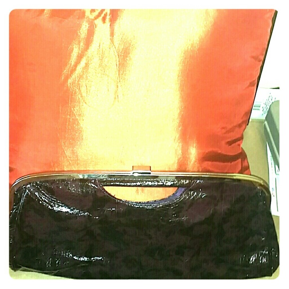 Large purple and black snakeskin clutch