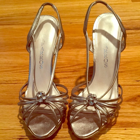 Silver copper heels with 6 piece diamond cluster.