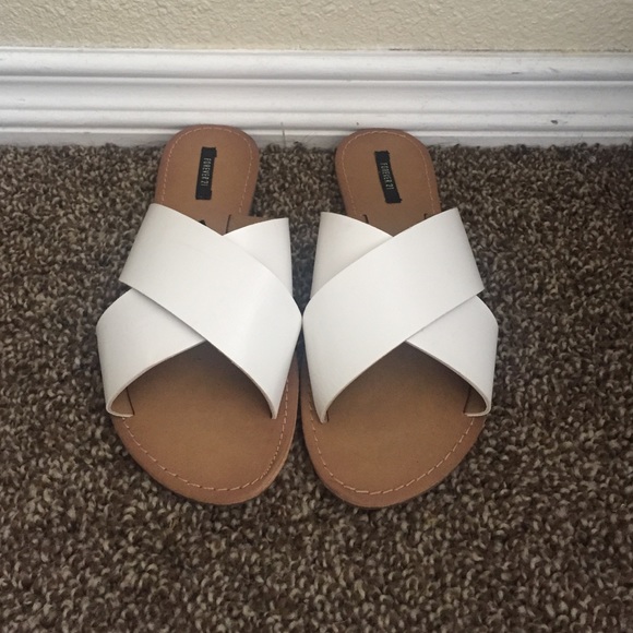 White flat sandals