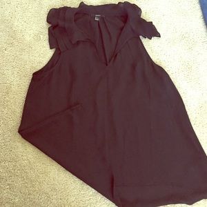 Sheer black ruffle top.