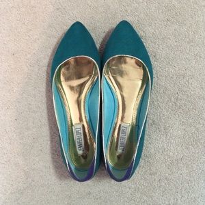 Green pointy flats