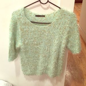 Green fluffy jumper