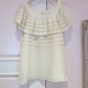 Juice Couture flowy ivory shirt with flowers.