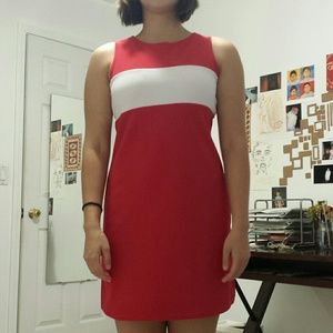 Sleeveless red dress with white stripe