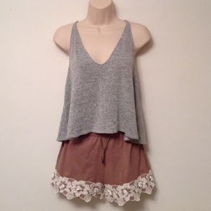 A loose tank top with loose racer back straps