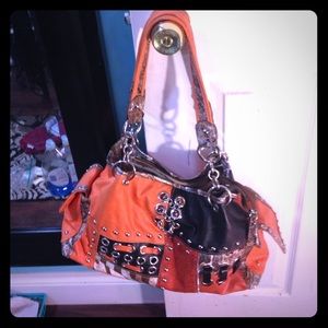 Snake print orange and black hand bag