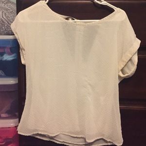 White shirt with poka dots and zipper