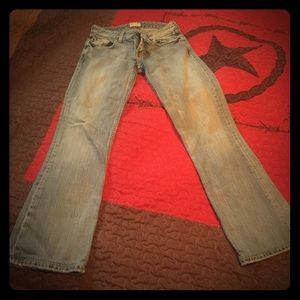 Women's buckle jeans
