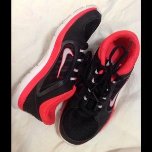 Neon pink/ black Nike running shoes
