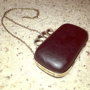 Brass knuckles clutch