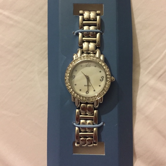 Avon silver watch