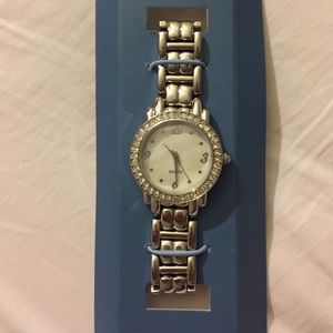 Avon silver watch