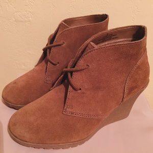Brown suede wedge booties.