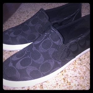 Black Coach Slip ons
