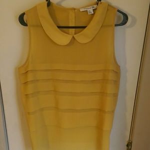 Mustard yellow sleeveless blouse