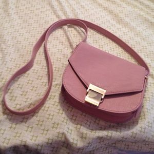 Dusty pink colored small purse