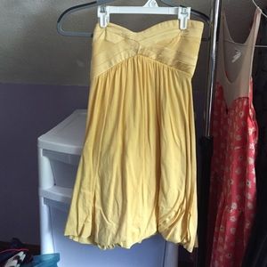 strapless yellow Bebe dress