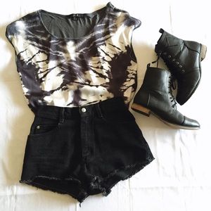 White and gray blouse.