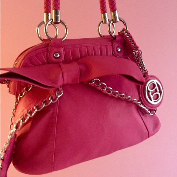 Bebe hot pink bow purse.