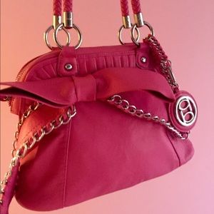 Bebe hot pink bow purse.