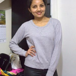 Grey crewneck sweatshirt