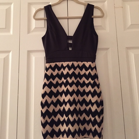 Black and beige patterned mini dress