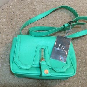 Green/blue Danielle Nicole Cato crossbody purse.