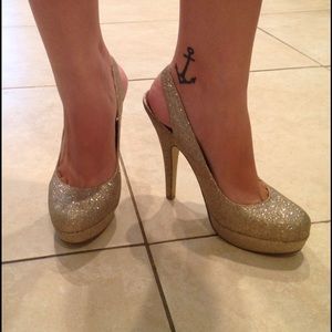 Madden girl sling back gold glitter heels.