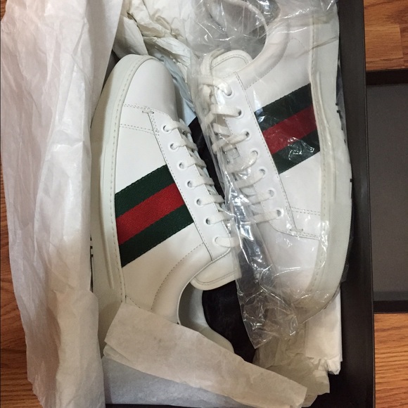 100% authentic gucci sneakers new in the box .