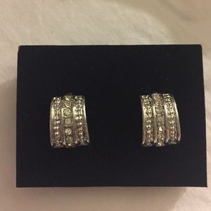 Small silver earrings with clear rhinestones