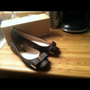 Brown Michael Kors flats w/bows.