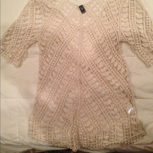 Cream bathing suit cover up with cutouts