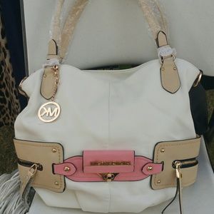 Designer Handbag with attachable strap inside