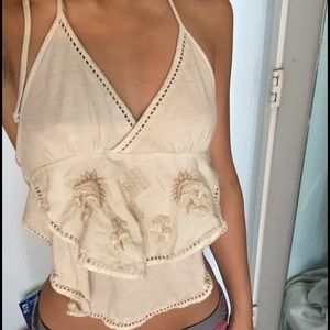 Nude halter crop top