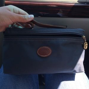Long champ hand purse.