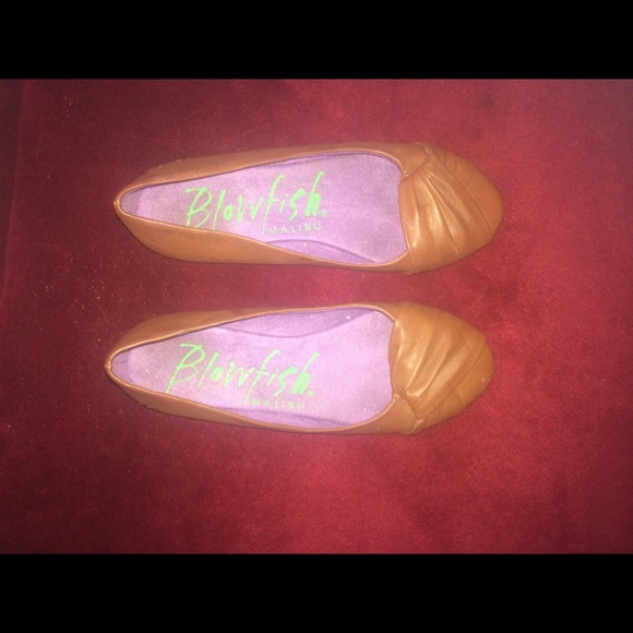 Tan slip ons.