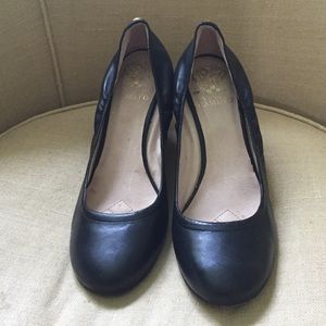 Black wedge pumps