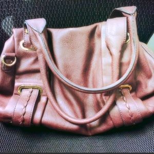 Brownish/purple purse with floral silk interior