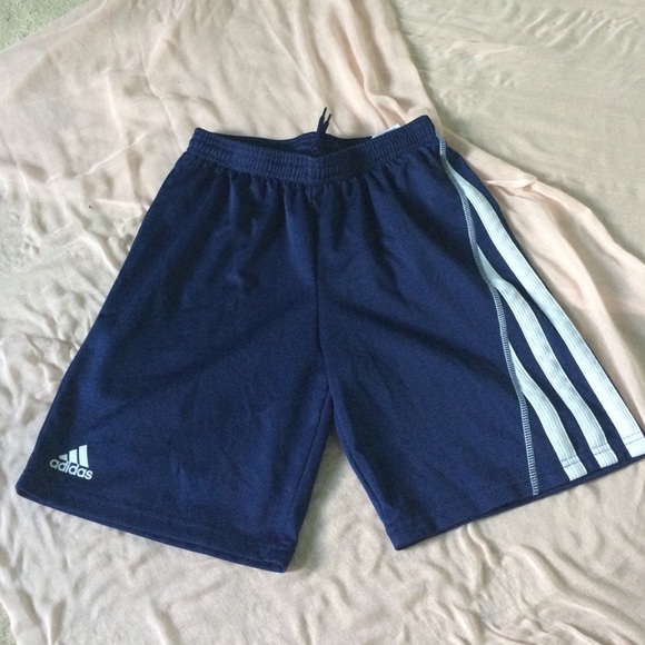 Navy blue and white Adidas soccer shorts